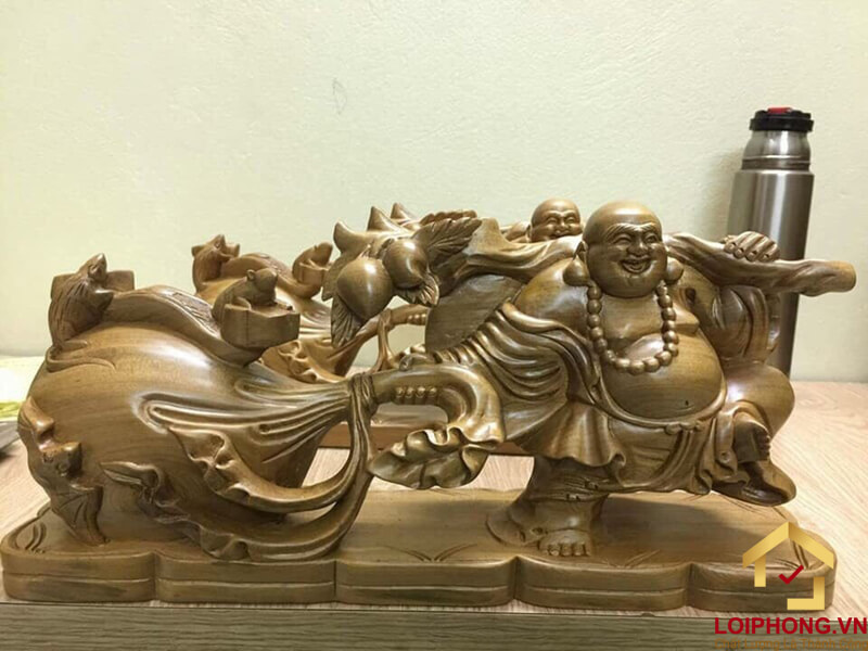 Tượng Phật Di Lặc kéo bao tiền gỗ bách xanh
